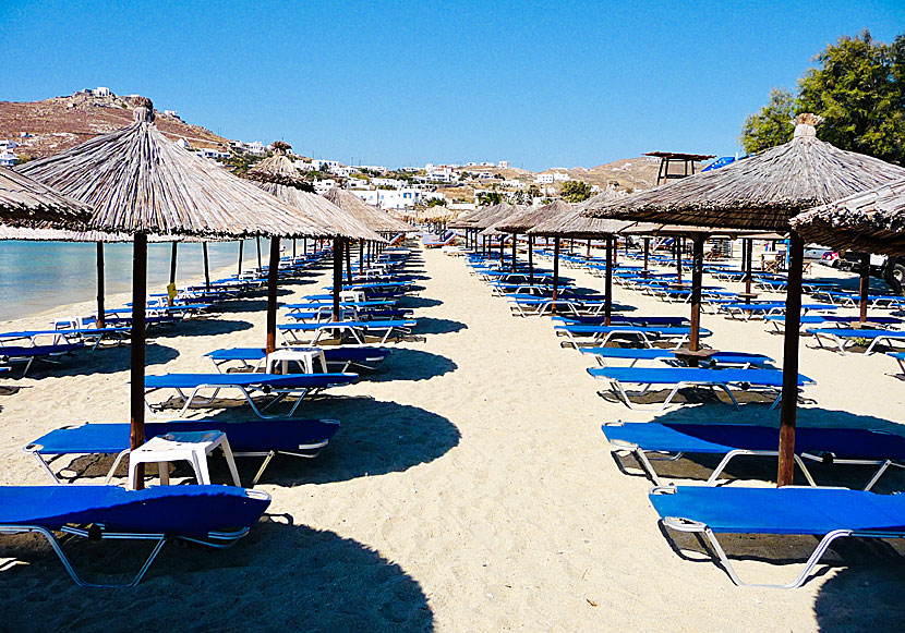 Sun beds in Ornos beach in Mykonos.