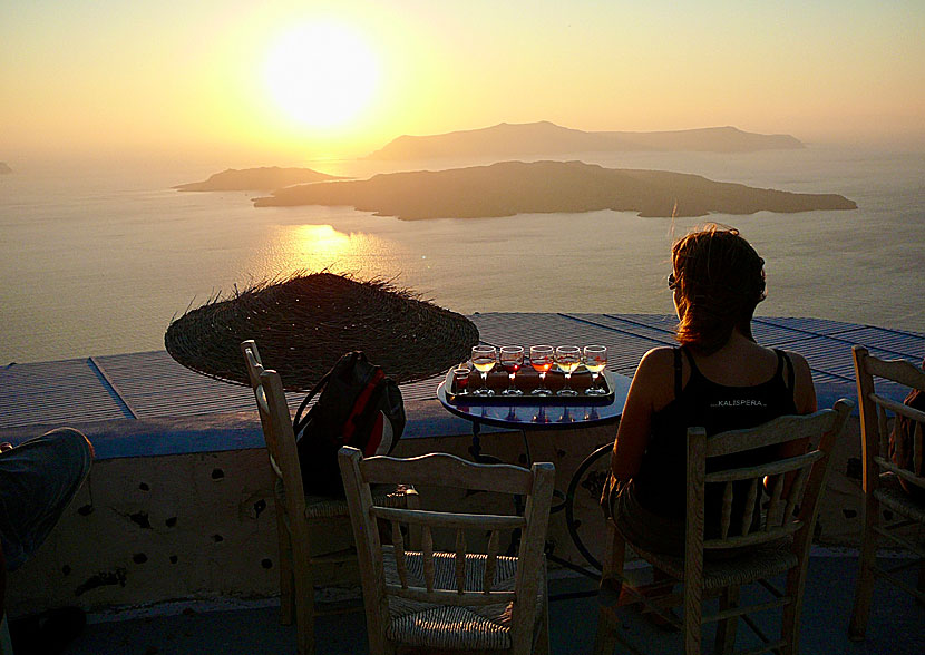 Don't miss the sunset behind the volcanoes and the island of Thirasia from Santo Wines in Santorini.