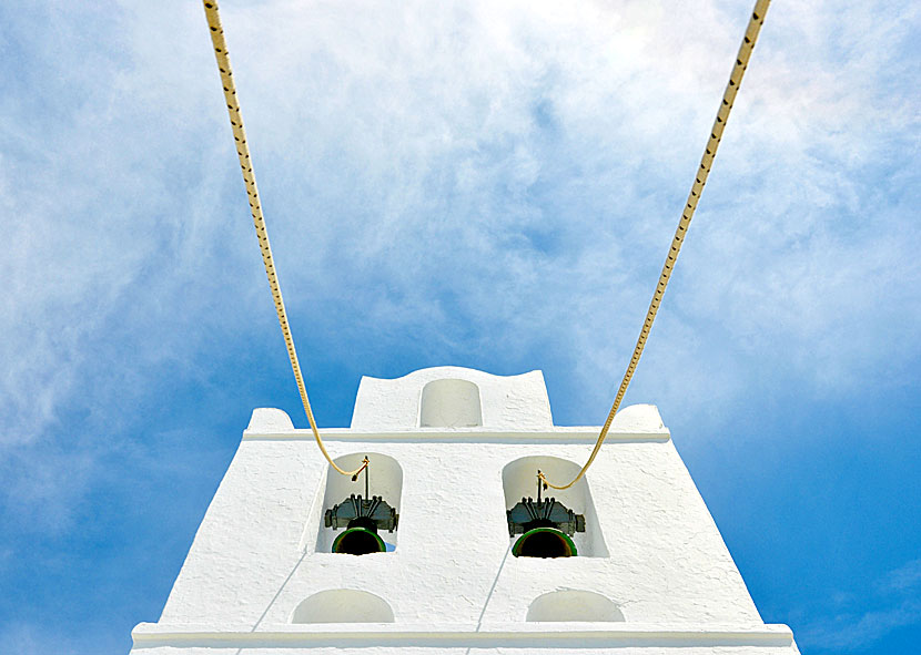 Church bells and churches on Sifnos in Greece.