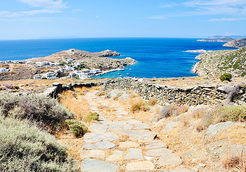 Hiking to Faros from Kastro in Sifnos along old donkey trail .