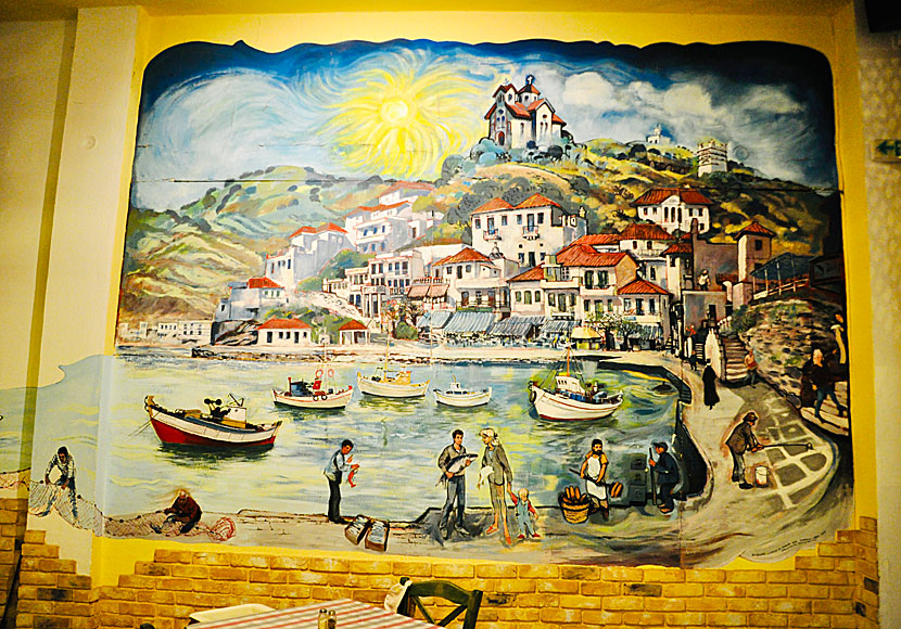 Agios Filippos church and the fishing harbor on a painting in Restaurant The Dolphins in Batsi.