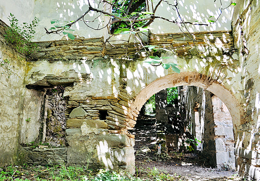 Deserted houses, abandoned villages and factories on Andros in Greece.