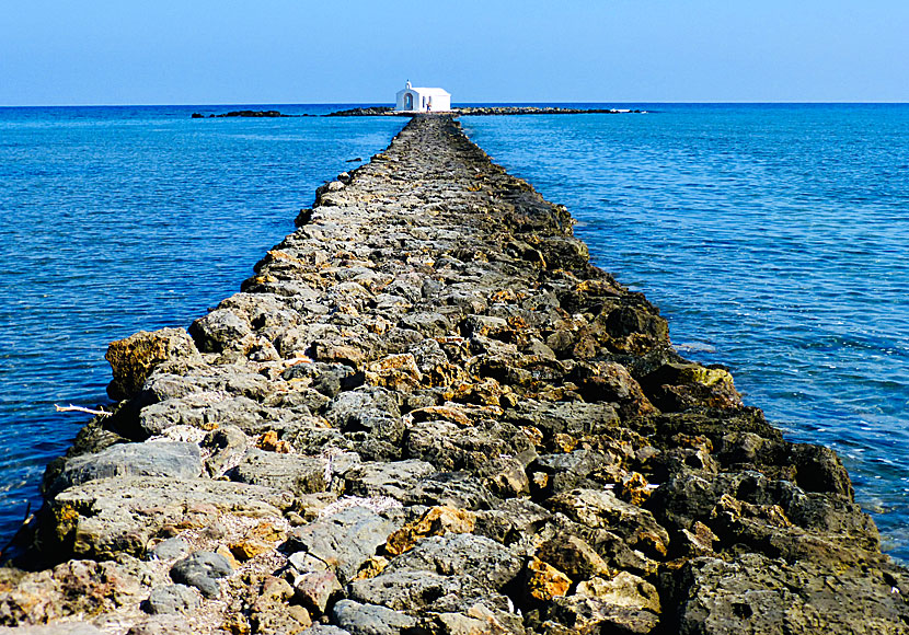 The pier and Agios Nikolaos church are a popular destination for all tourists in Georgioupolis on Crete.