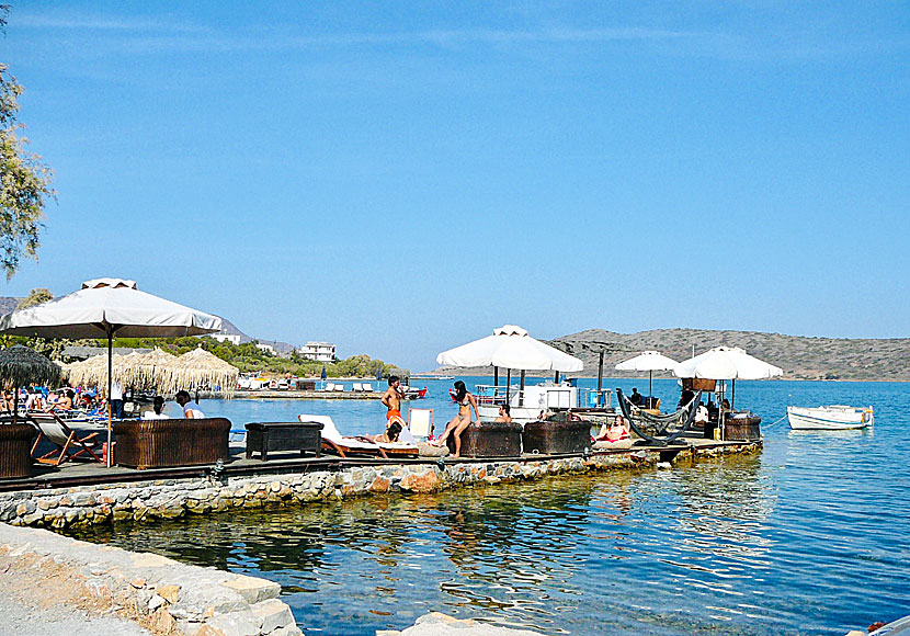 Bath jettys and bars with umbrella drinks in Elounda near Agios Nikolaos and Plaka.