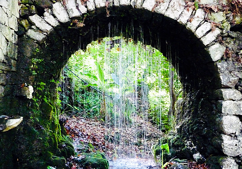 Beautiful and very old arch with running water in Argiroupolis near Rethymnon in Crete.