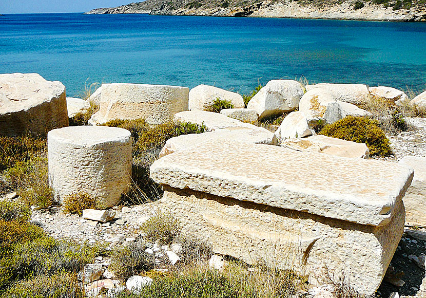 Columns, Ionic capitals, altars and sarcophagi in the ancient marble quarry at Fourni in Greece.