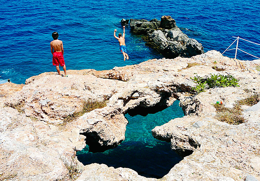 From the rocks at Spilia beach you can dive into the turquoise crystal clear water.