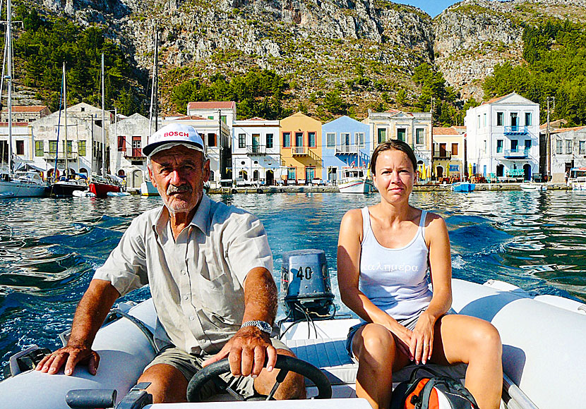 On the way to the blue cave on Kastellorizo with a small rubber boat.