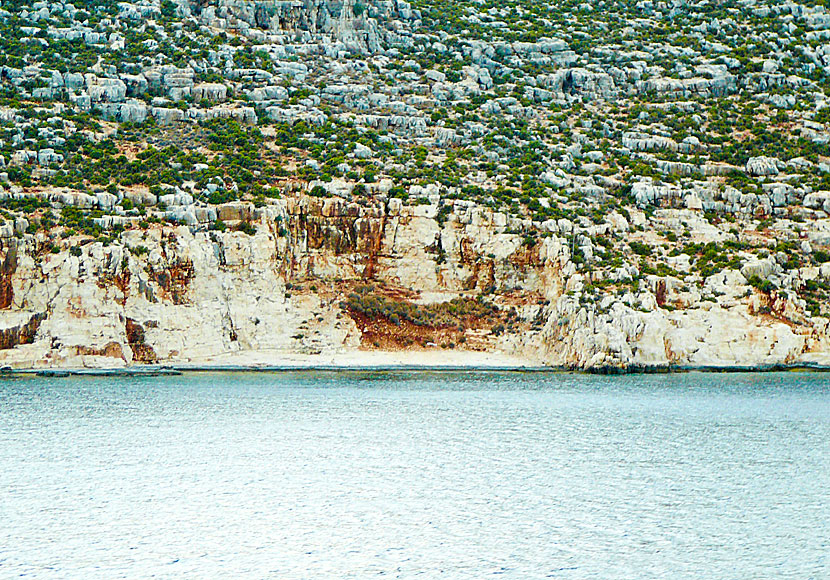 The limestone beach Plakes beach on Kastellorizo in Greece.