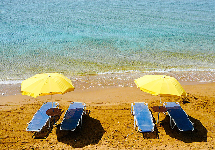 Xi beach consists of fine reddish-brown sand and it is shallow.