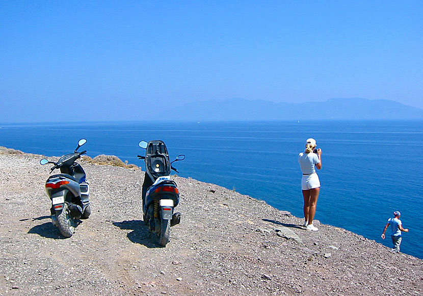 Ride a scooter to the hot springs in Therma.