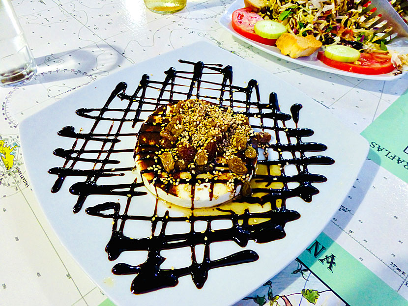 Grilled Manouri Cheese is one of the dishes at Ouzeria Dimitris O Karaflas.