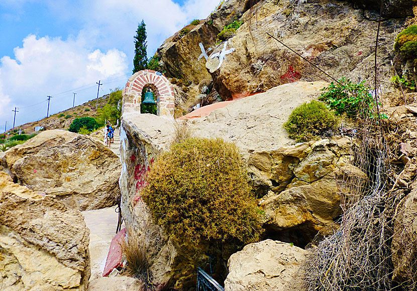 Cross on the roof and church bells on Leros in Greece.