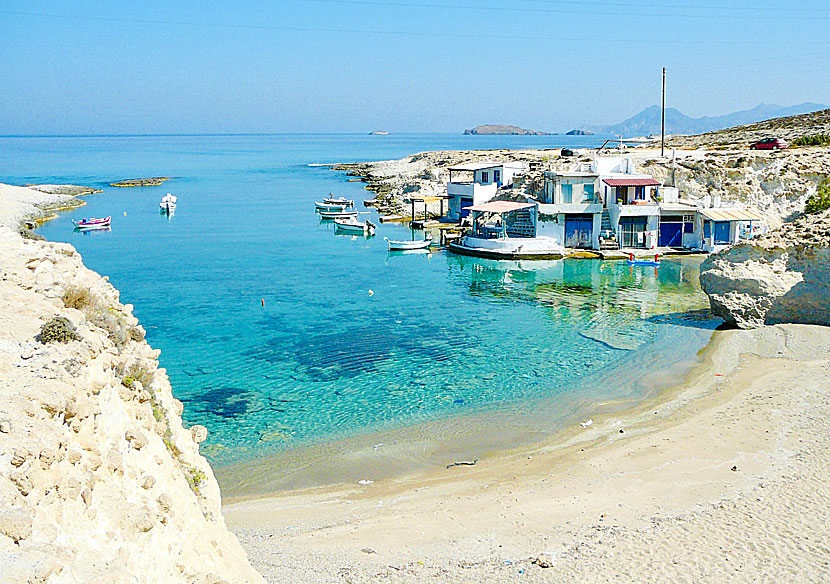 The cute boathouses (Smyrna) at Mitakas beach on Milos.