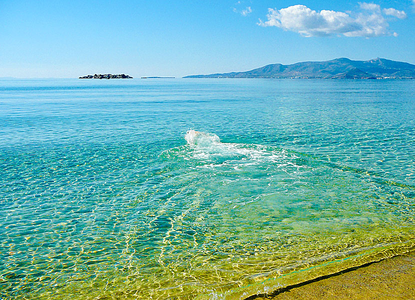 Sunbathe and swim nude at Plaka beach on Naxos.