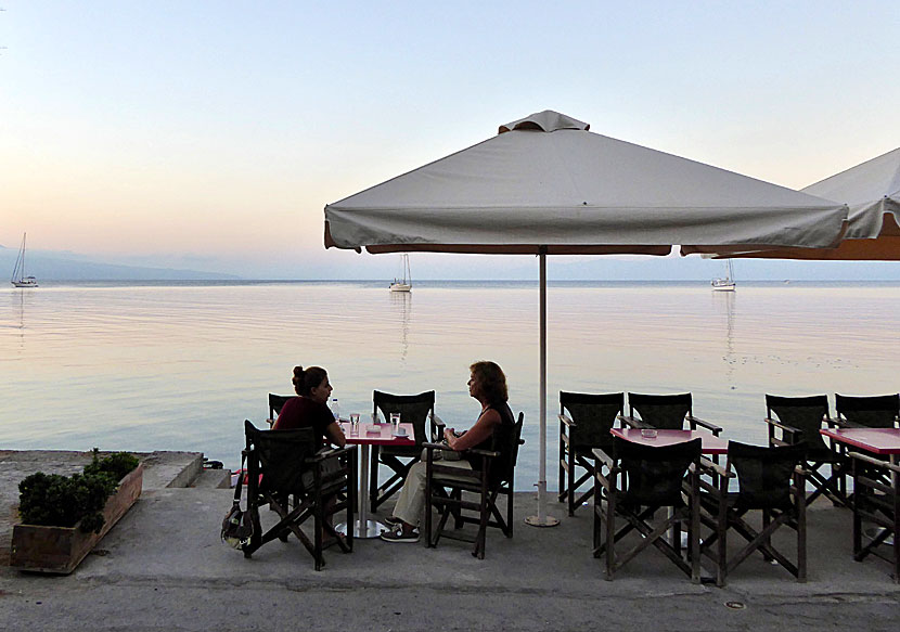 Cozy cafes along the harbor promenade in Koroni.