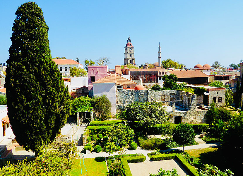 The clock tower and minaret of the Suleymaniye Mosque in Rhodes Old Town.