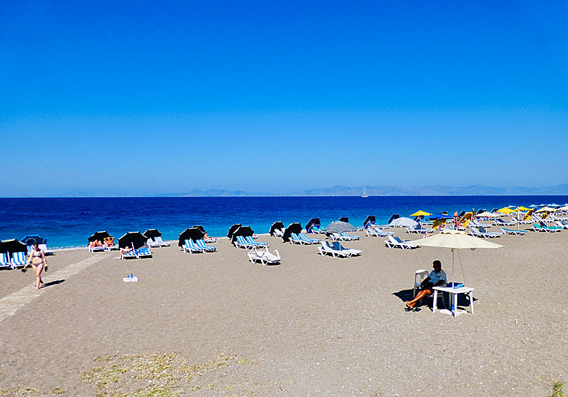 Rent sunbeds and umbrellas Windy beach in Rhodes town.