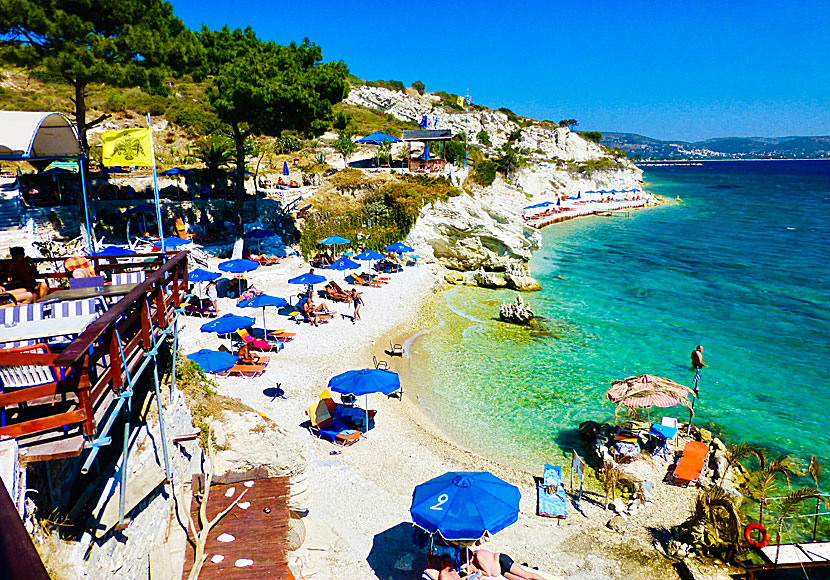 The taverna and Nicos Island on Papa beach in Samos.