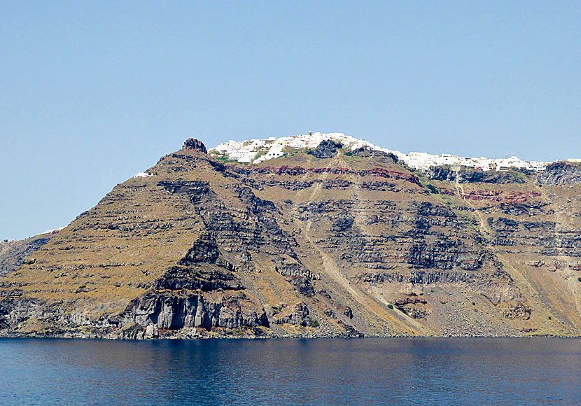 The village of Imerovigli and Skaros Rock seen from the volcanic crater of Santorini.