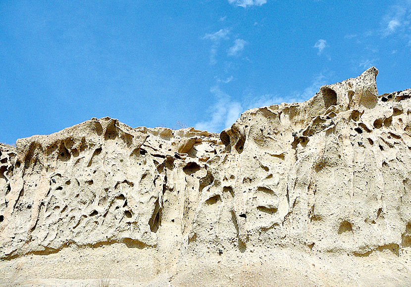 The cliffs surrounding Vlychada beach on Santorini look like a lunar landscape.