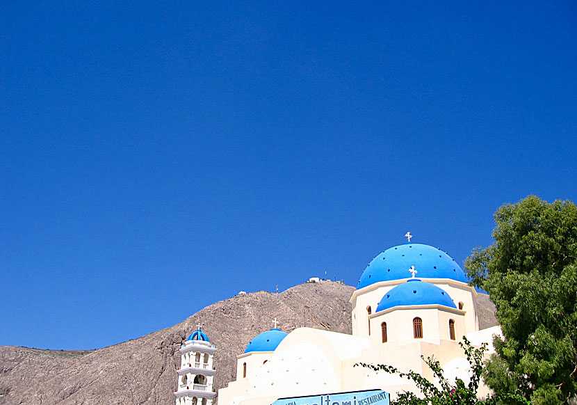 Perissa church is located near the grey-black sand beach.