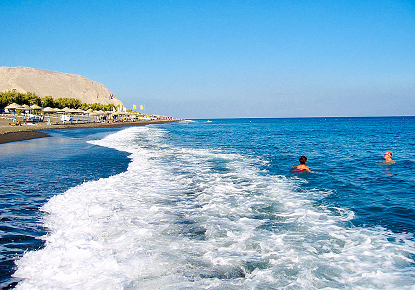 The beaches Perivolos and Perissa in Santorini.