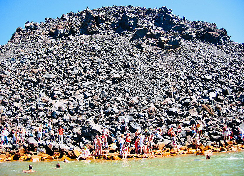 Swim in hot springs at the volcanoes of Santorini in the Cyclades.