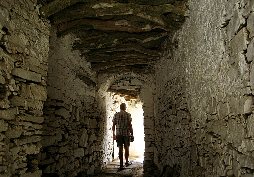 Whitewashed arches, alleys and stairs in typical Cycladic style.