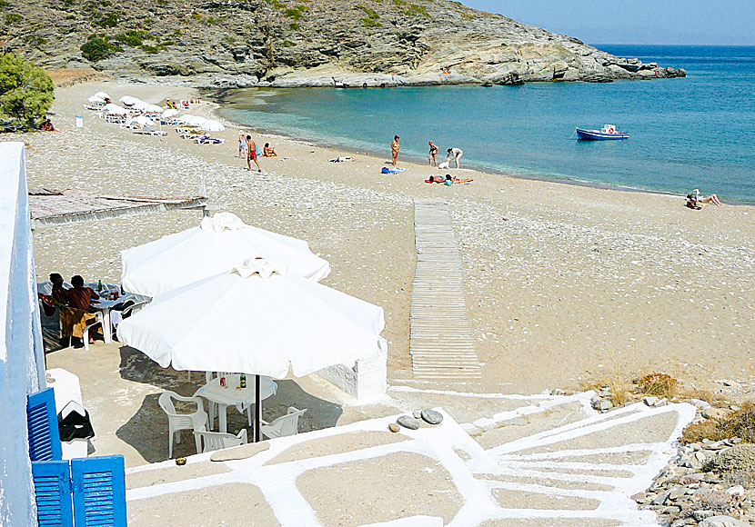 Agios Georgios beach and taverna on the island of Sikinos in Greece.