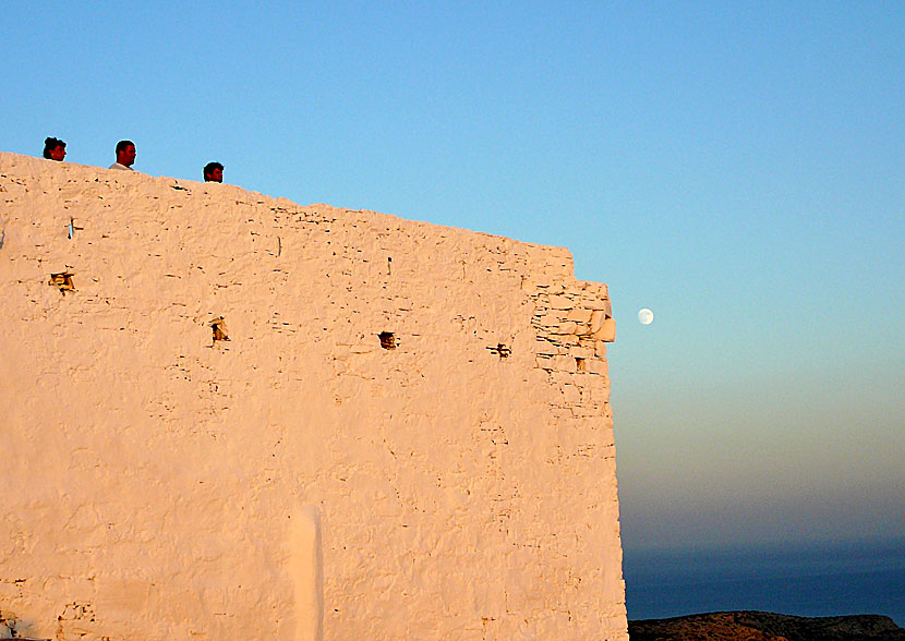 Sunset and full moon at Sikinos in Greece.