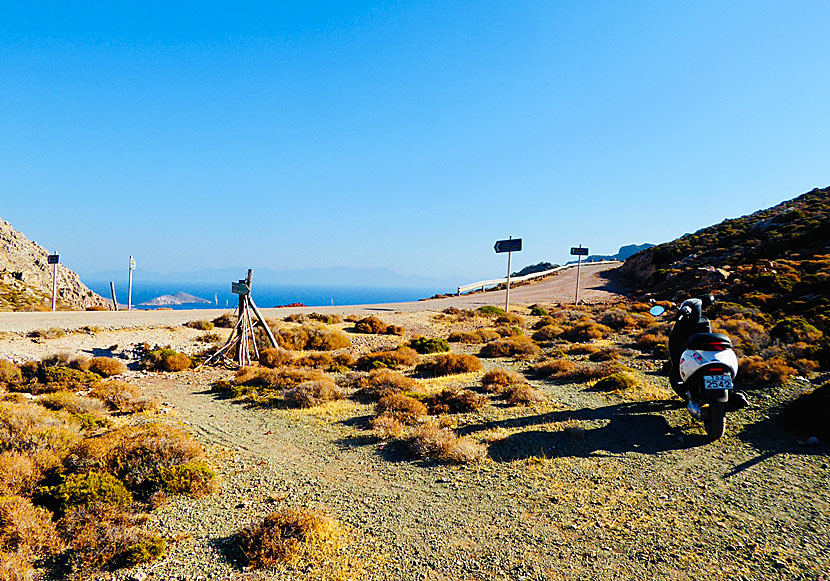 The easiest way is to drive a car or moped to the path where the hike down to Tholos beach begins.