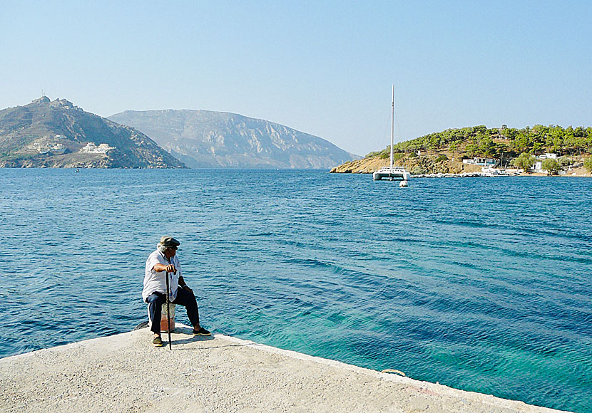 (Sittin' n) On the dock of the bay with Otis Redding in the port of Telendos in Greece.