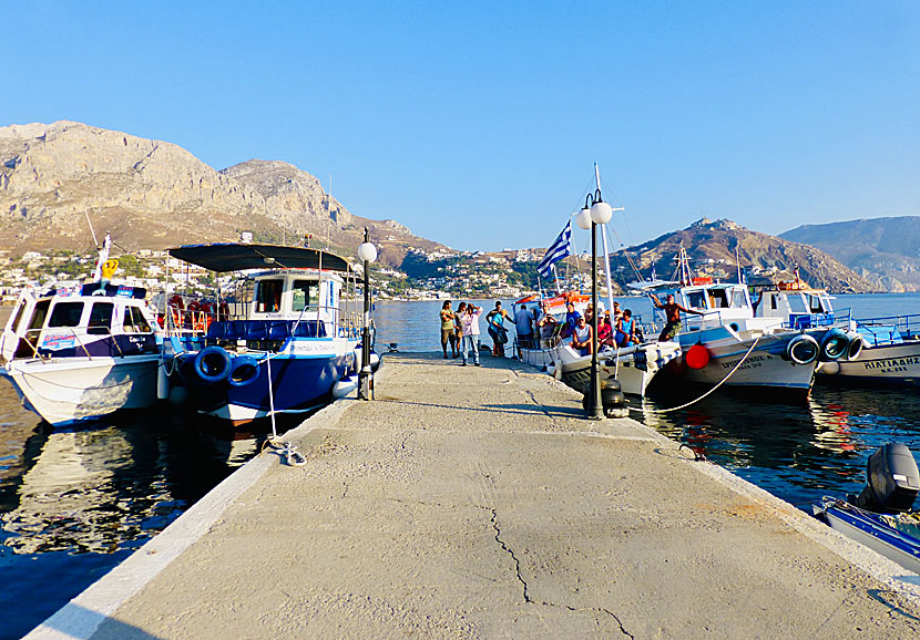 Go by boat between Kalymnos and Telendos in the Dodecanese.
